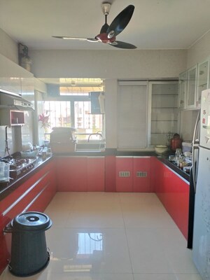 Kitchen in 3 BHK Apartment at Garden Court, Waghbil – for Rent