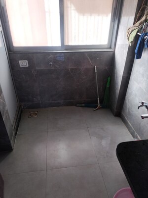 Bathroom in 3 BHK Apartment at Garden Court, Waghbil – for Rent