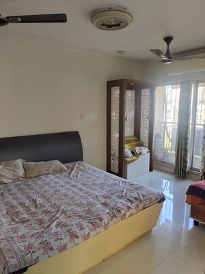 Bedroom in 3 BHK Apartment at Garden Court, Waghbil – for Rent
