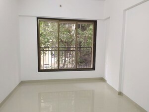 Room in 2 BHK Apartment at Tarapore Gardens, Andheri West – for Rent