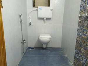Bathroom in 2 BHK Apartment at Tarapore Gardens, Andheri West – for Rent