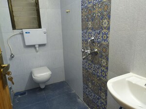 Bathroom in 2 BHK Apartment at Tarapore Gardens, Andheri West – for Rent