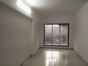 Room in 2 BHK Apartment at Tarapore Gardens, Andheri West – for Rent