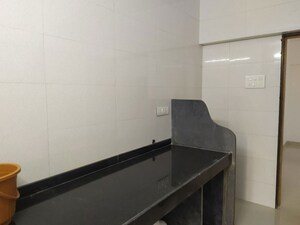 Kitchen in 2 BHK Apartment at Tarapore Gardens, Andheri West – for Rent