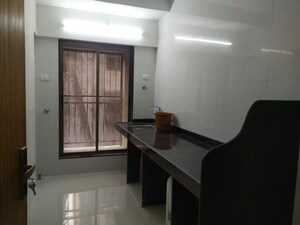 Kitchen in 2 BHK Apartment at Tarapore Gardens, Andheri West – for Rent