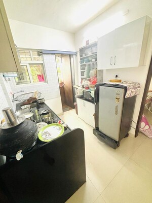 Kitchen in 1.5 BHK Builder Floor at Parth Heights Apartment, Aundh – for Sale