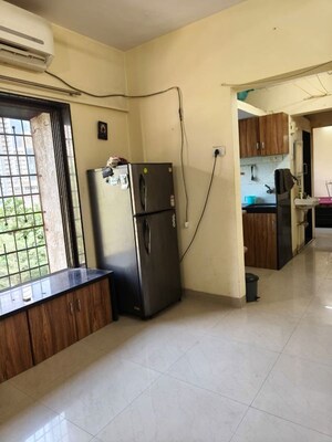 Living Room in 1 BHK Apartment at Sai Milan CHS, Worli – for Rent