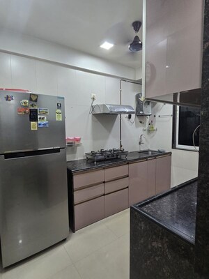 Kitchen in 1 BHK Apartment at Guru Niwas Building, Andheri East – for Sale