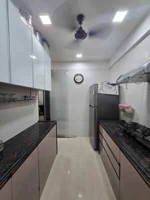 Kitchen in 1 BHK Apartment at Guru Niwas Building, Andheri East – for Sale