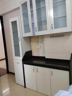 Kitchen in 3 BHK Apartment at Gemstar Symphony, Kandivali West – for Rent