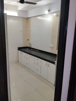 Kitchen in 3 BHK Apartment at Gemstar Symphony, Kandivali West – for Rent