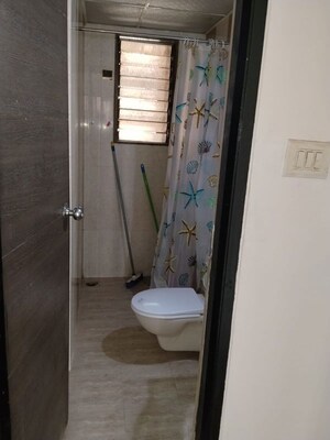 Bathroom in 3 BHK Apartment at Gemstar Symphony, Kandivali West – for Rent