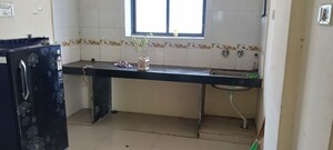 Kitchen in 1 BHK Apartment at Sadafully Park, Aundh – for Sale