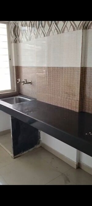 Kitchen in 1 BHK Apartment at Kamgar Putala Vasahat – for Sale