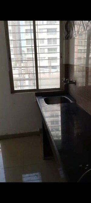 Kitchen in 1 BHK Apartment at Kamgar Putala Vasahat – for Sale