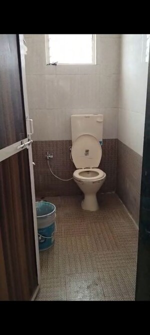 Bathroom in 1 BHK Apartment at Kamgar Putala Vasahat – for Sale