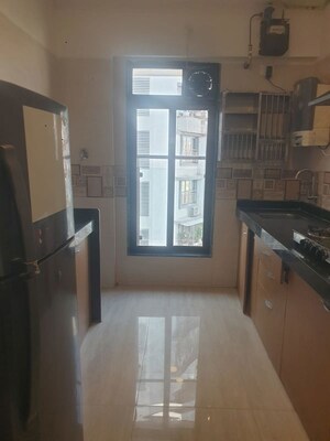 Living Room in 1 BHK Apartment at Je and Vee Vrindavan, Malad East – for Rent