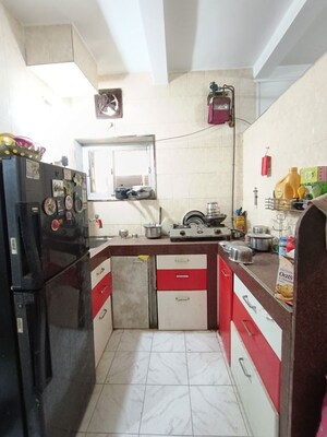 Kitchen in 2 BHK Apartment at Jeevan Santosh CHS, Borivali West – for Sale