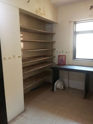 Kitchen in 1 BHK Apartment at Raunak Unnathi Woods Phase 4 And 5, Ghodbunder Road – for Rent