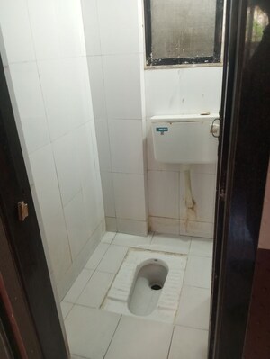 Bathroom in 1 BHK Apartment at Raunak Unnathi Woods Phase 4 And 5, Ghodbunder Road – for Rent