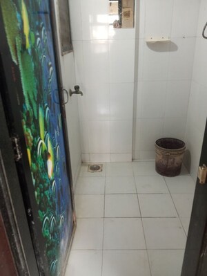 Bathroom in 1 BHK Apartment at Raunak Unnathi Woods Phase 4 And 5, Ghodbunder Road – for Rent