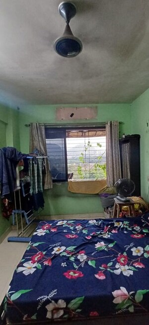 Living Room in 1 BHK Apartment at Kalwa – for Sale