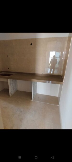 Kitchen in 3 BHK Apartment at Dosti West County, Balkum Pada – for Sale