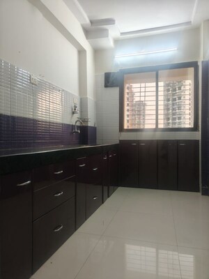 Kitchen in 2 BHK Apartment at Gahlot Majesty and Avenue CHS, Seawoods – for Rent