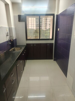 Kitchen in 2 BHK Apartment at Gahlot Majesty and Avenue CHS, Seawoods – for Rent