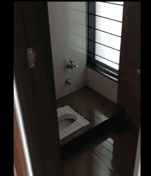 Bathroom in 2 BHK Apartment at Mansarovar Pearl Gardens, Vasai West – for Rent