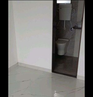 Bathroom in 2 BHK Apartment at Mansarovar Pearl Gardens, Vasai West – for Rent