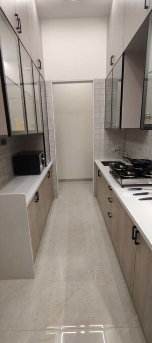 Kitchen in 1 BHK Apartment at Godrej Vihang, Ghodbunder Road – for Sale