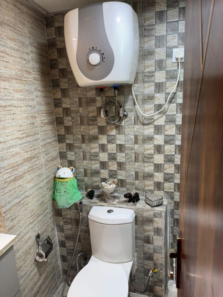 Bathroom, casa-woodstock 2 Bedroom 1115 Sq.Ft. Apartment In Sector 16c Greater Noida Greater Noida 10403629