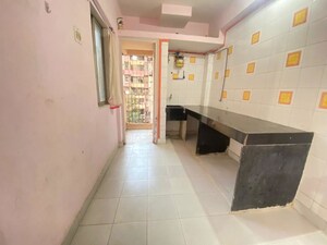 Kitchen in 1 BHK Apartment at Soham Parijat Gardens, Ghodbunder Road – for Rent