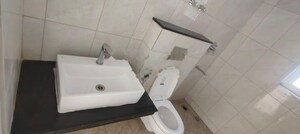 Bathroom in 2 BHK Apartment at Kohinoor Courtyard One, Wakad – for Rent