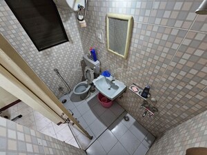 Bathroom in 2 BHK Apartment at Daffodils Apartment, Pashan – for Rent