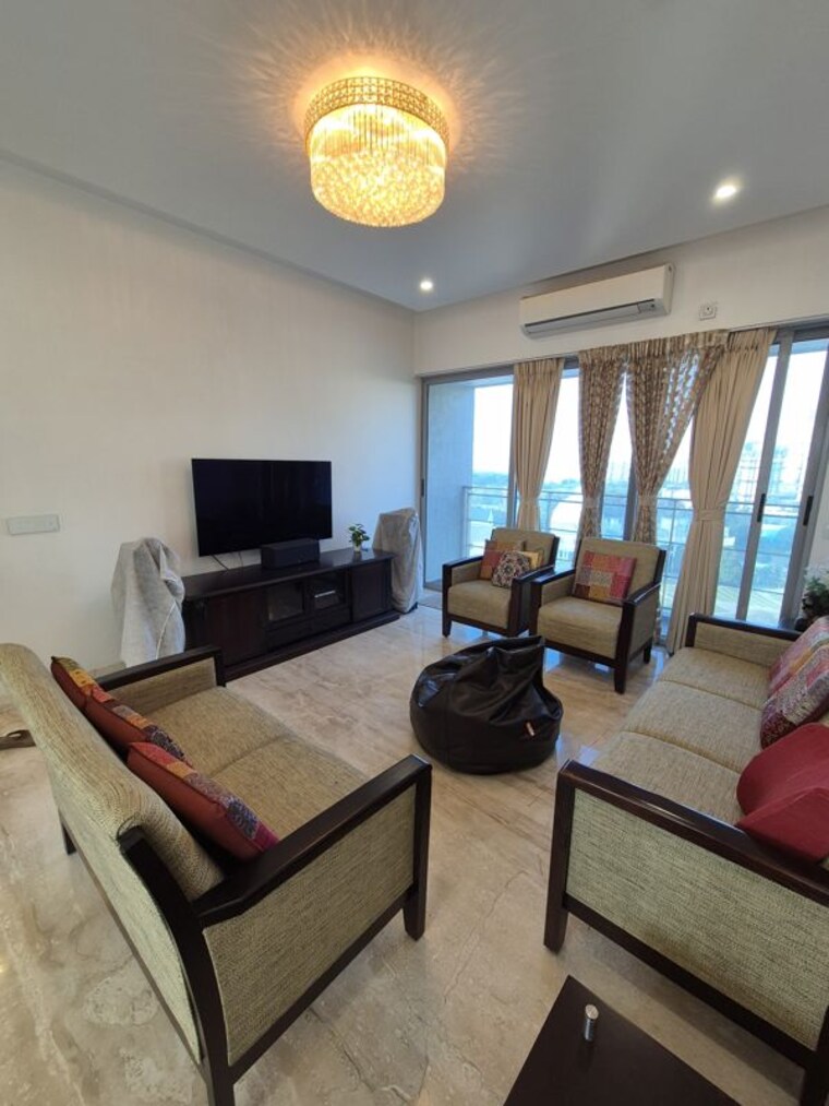 Living Room, amanora-gold-towers 2 Bedroom 920 Sq.Ft. Apartment In Hadapsar Pune 10403867