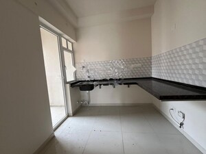 Kitchen in 2 BHK Apartment at Godrej Green Vistas, Mahalunge – for Rent
