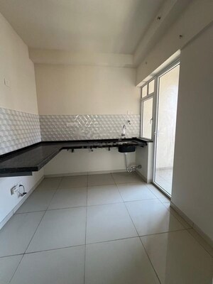 Kitchen in 2 BHK Apartment at Godrej Green Vistas, Mahalunge – for Rent