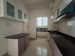 Kitchen in 2 BHK Apartment at Adhiraj Magnolia, Kharghar – for Rent