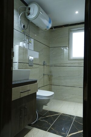 Bathroom in 1 BHK Builder Floor at DLF Atria, Dlf Phase ii – for Rent