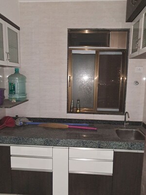 Kitchen in 2 BHK Apartment at Anmol CHS Goregaon, Goregaon West – for Rent