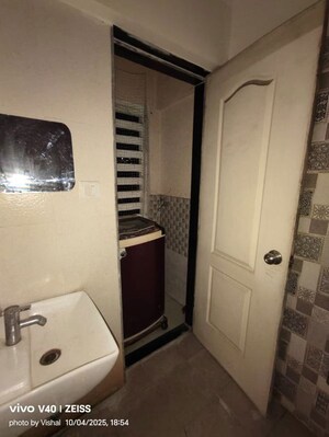 Bathroom in 1 BHK Apartment at Cosmos Enclave, Kasarvadavali – for Rent