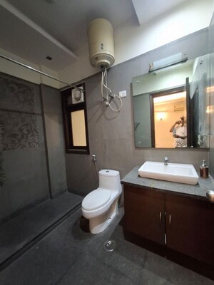 Bathroom in 4 BHK Builder Floor at New Friends Colony – for Rent