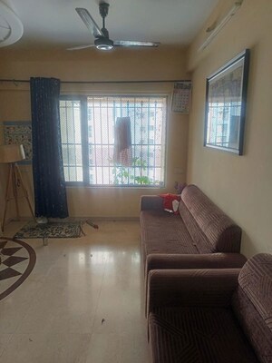 Living Room in 2 BHK Apartment at Twinkle Towers CHS, Kailash Nagar – for Sale