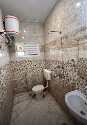 Bathroom in 4 BHK Builder Floor at Sector 37 – for Rent