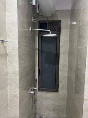 Bathroom in 2 BHK Apartment at Ruparel Ariana, Parel – for Rent