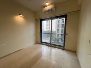 Room in 2 BHK Apartment at Ruparel Ariana, Parel – for Rent