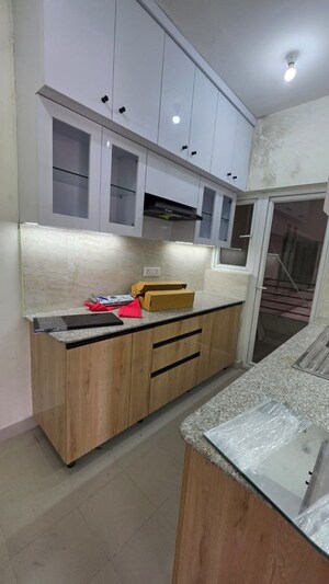 Kitchen in 3 BHK Apartment at Pardos Okas Residency, Sushant Golf City – for Rent