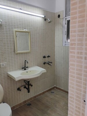 Bathroom in 4 BHK Apartment at Dwarka – for Rent
